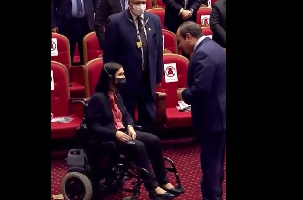 El-Sisi was seen walking to the other side of the hall to welcome Israeli Minister of Energy Karin Elharar, who was seated on a wheelchair. (Screengrab)