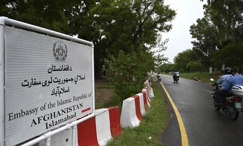 Policemen ride past the Afghan Embassy in Islamabad. (AFP/File)