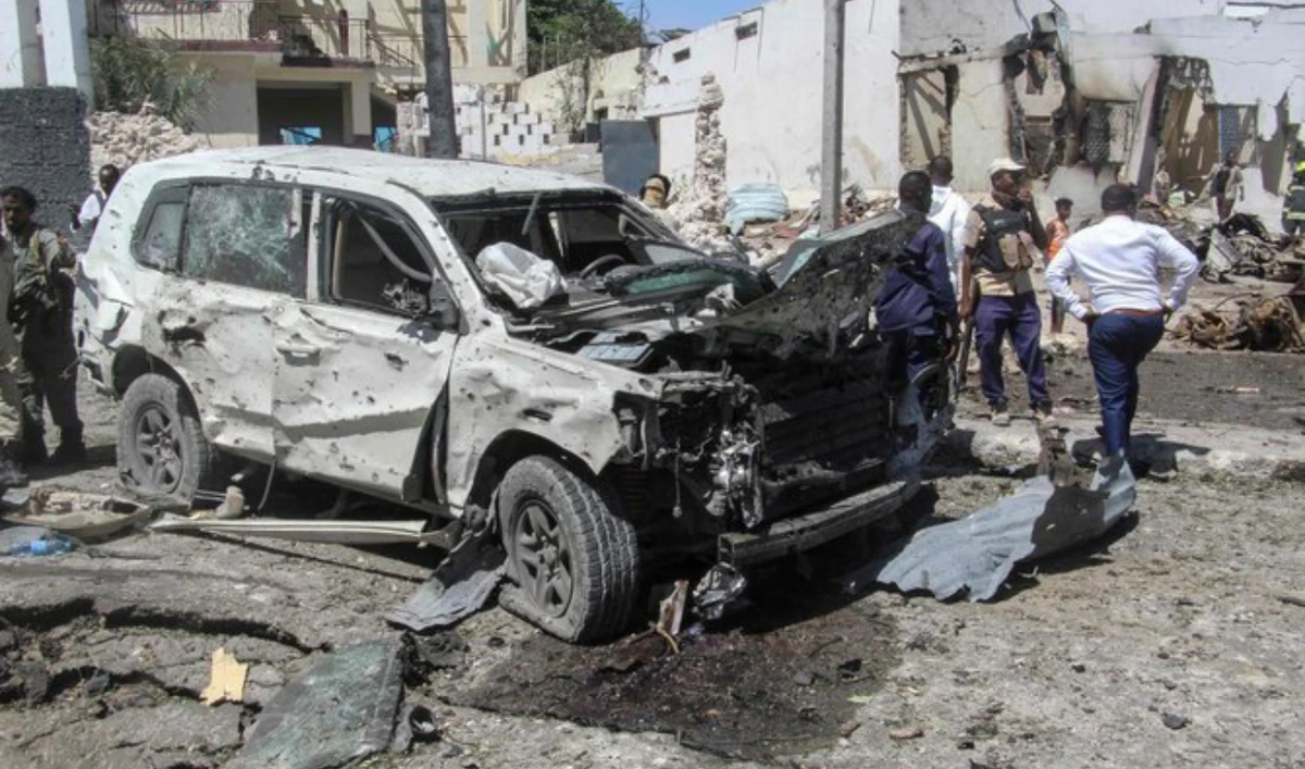 A general view of the scene of a car-bomb explosion claimed by the Al-Shabab militants in Mogadishu, Somalia, on January 12, 2022. (AFP/File)