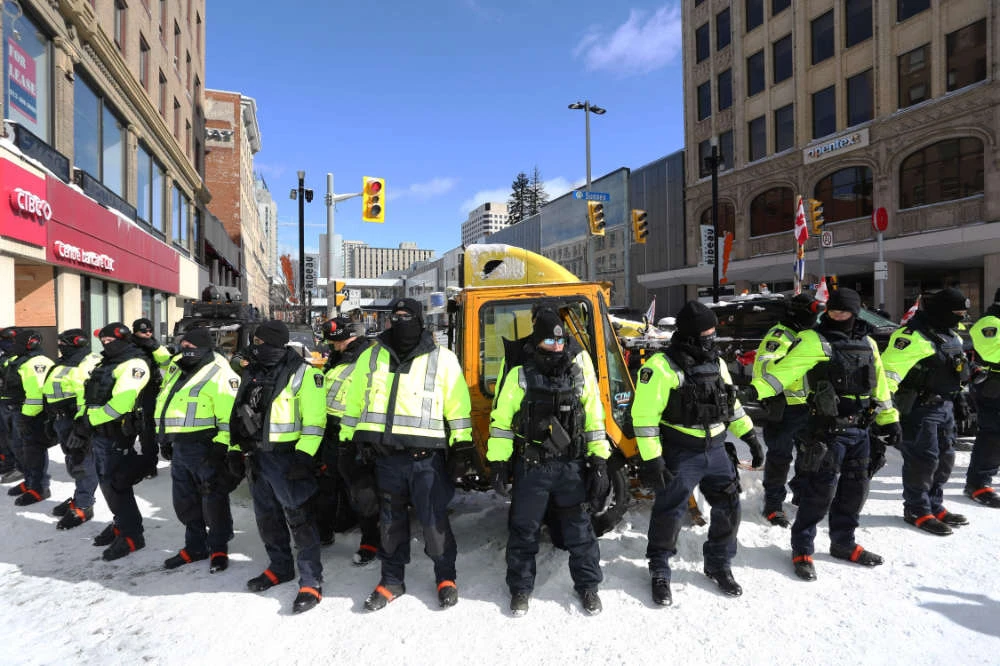Police deploy to remove demonstrators against Covid-19 mandates in Ottawa on February 18, 2022. (AFP)