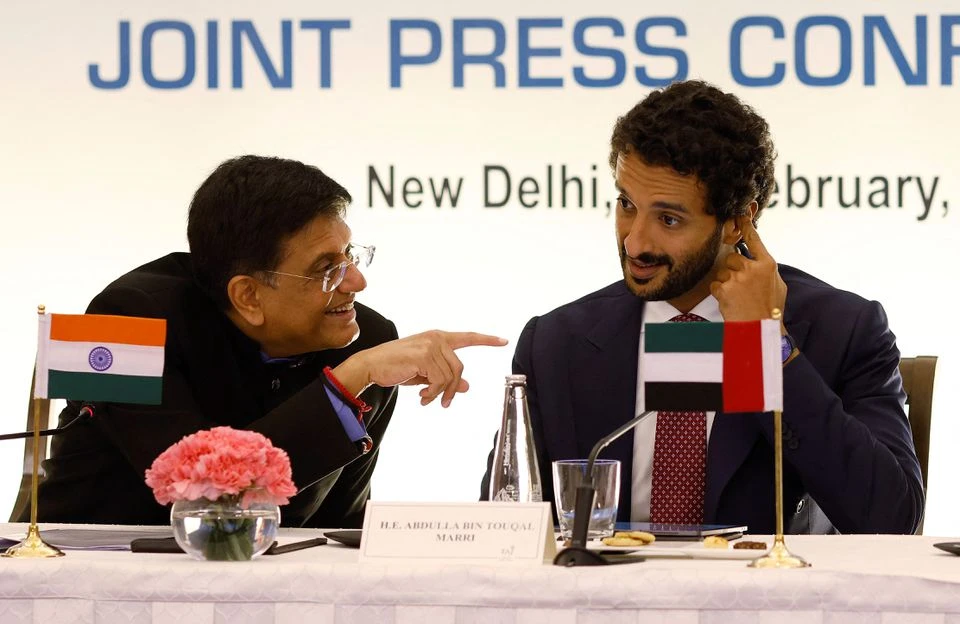 India's Minister of Commerce and Industry, Piyush Goyal talks to Abdulla Bin Touq Al Marri, Minister of Economy of the United Arab Emirates, (UAE), during their joint news conference in New Delhi, India, February 18, 2022. (REUTERS)
