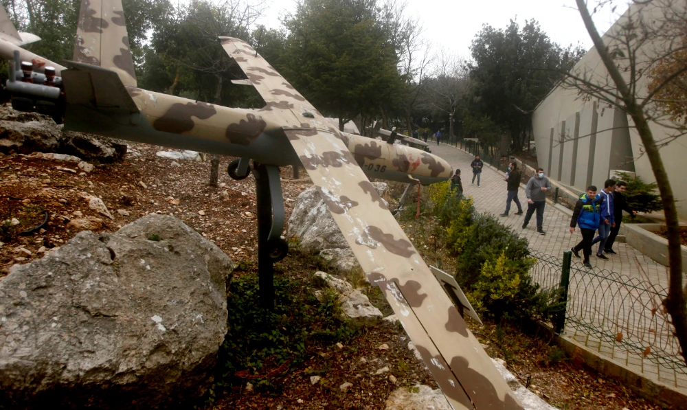 People a replica drone in a war museum operated by Hezbollah in Mlita Village, southern Lebanon, Saturday, Feb. 19, 2022. (AP)