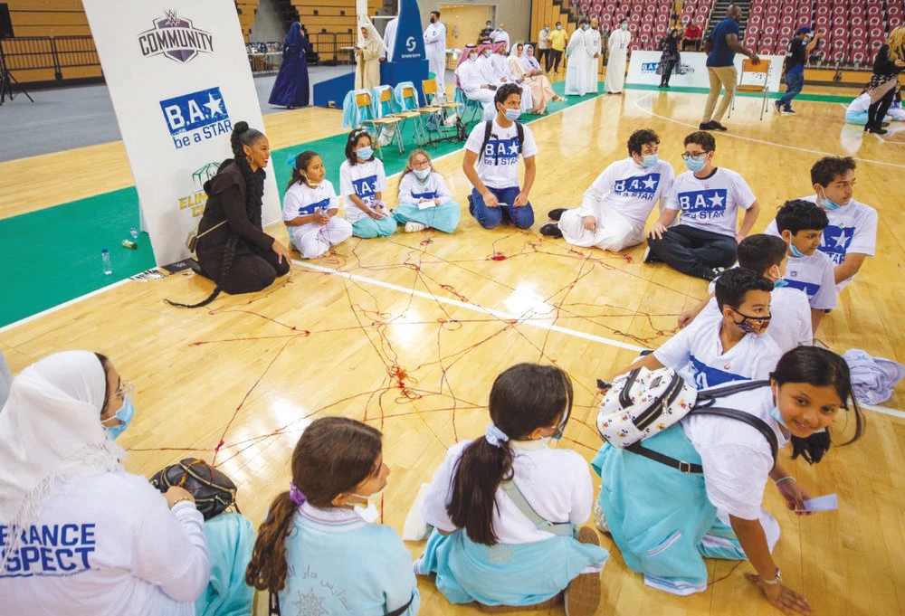 WWE superstars show Saudi students how to wrestle with bullying