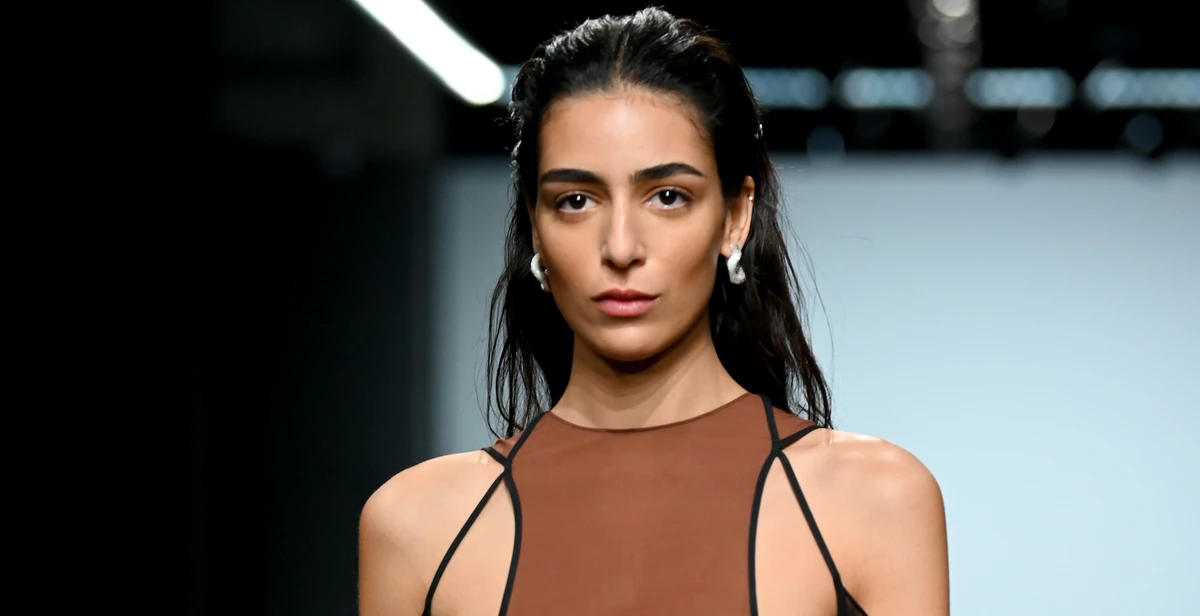 Model Nora Attal stuns on Nensi Dojaka Fall 2022 runway. Getty