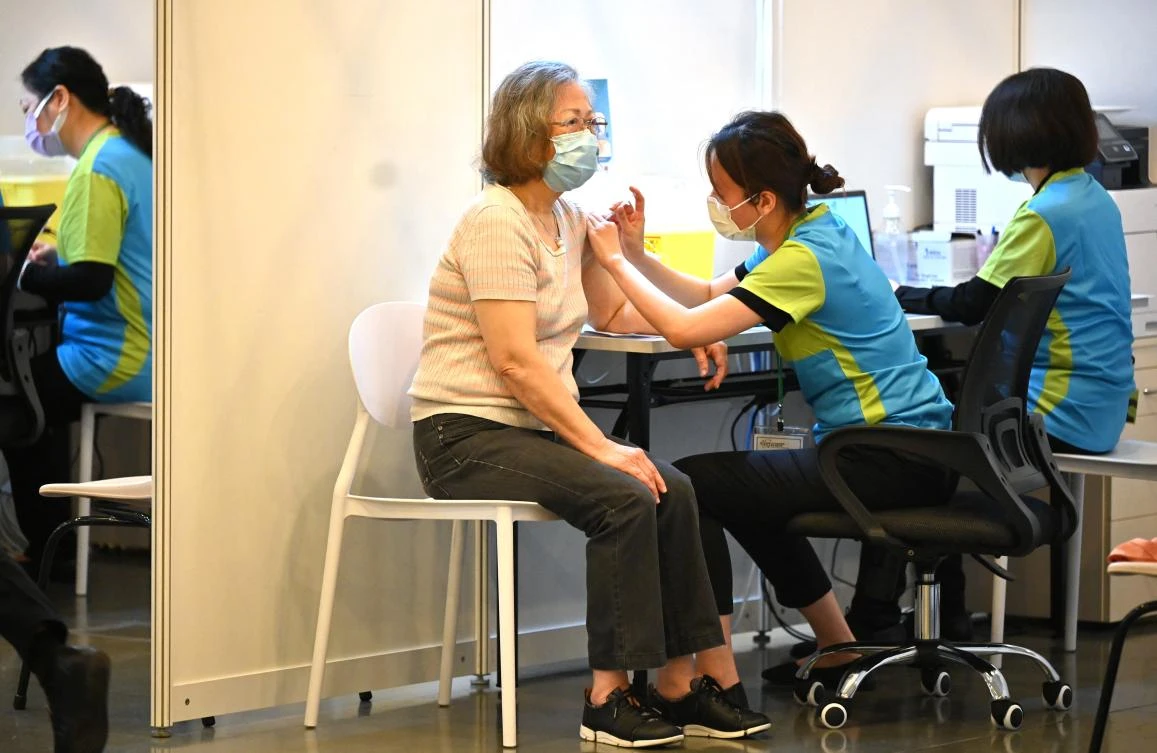 Hong Kong maps terms of COVID-19 vaccine pass amid record high cases