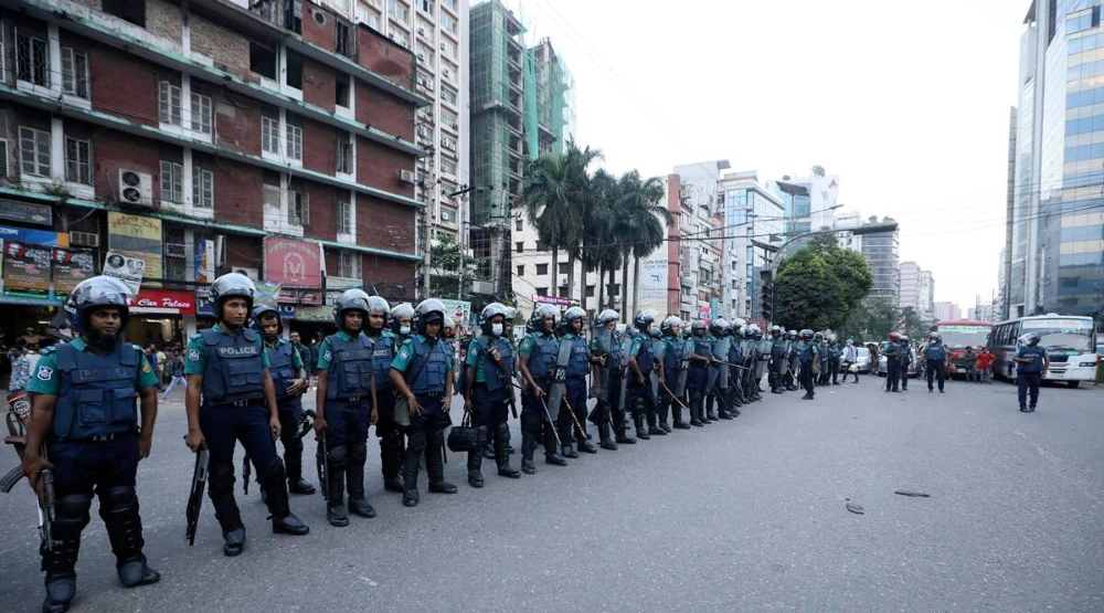 Riot police stand guard during a protest in Dhaka, Bangladesh. (AP/File)