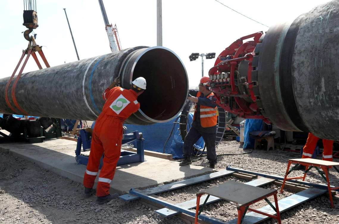 Workers at a construction site for the Nord Stream 2 gas pipeline, near the town of Kingisepp, Leningrad region, Russia, June 5, 2019. (Reuters)