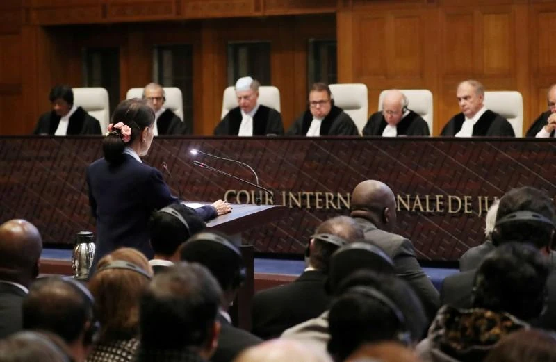 Aung San Suu Kyi addresses the court in a case filed by Gambia against Myanmar alleging genocide against the minority Muslim Rohingya population, ICJ, The Hague, Netherlands, Dec. 11, 2019. (Reuters)