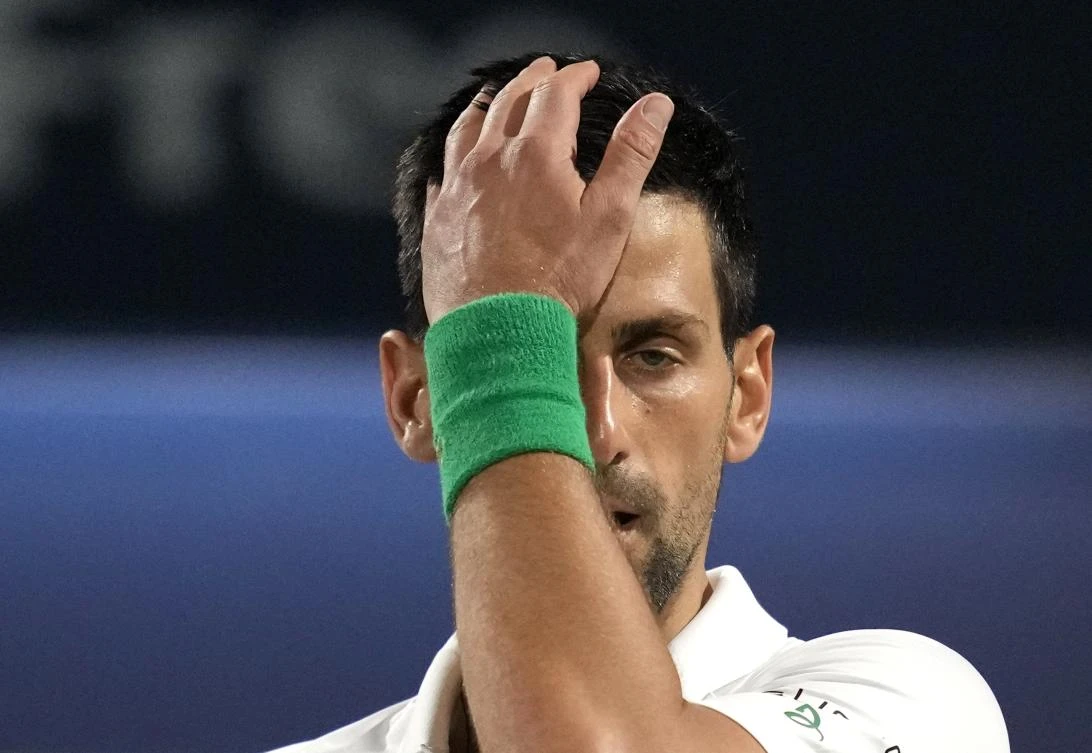 Serbia’s Novak Djokovic reacts after he lost a point against Czech Republic’s Jiri Vesely during a quarterfinal match of the Dubai Duty Free Tennis Championship in Dubai on Thursday. (AP)