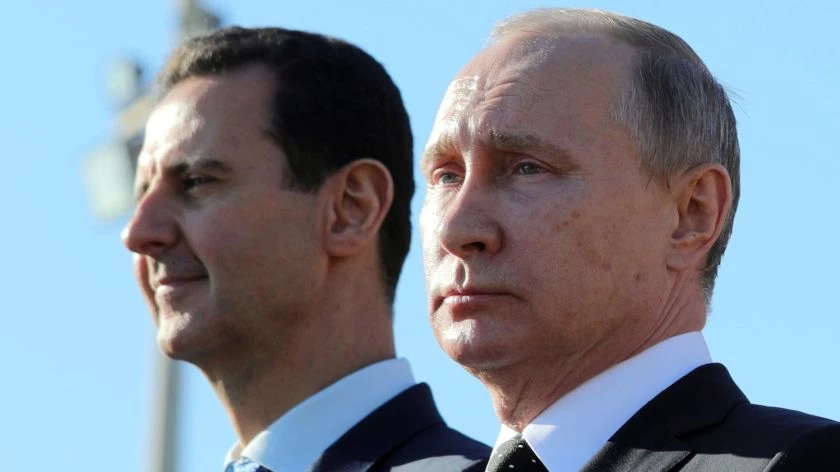 Russian President Vladimir Putin and Syrian President Bashar Assad in Syria in 2017. (AP)