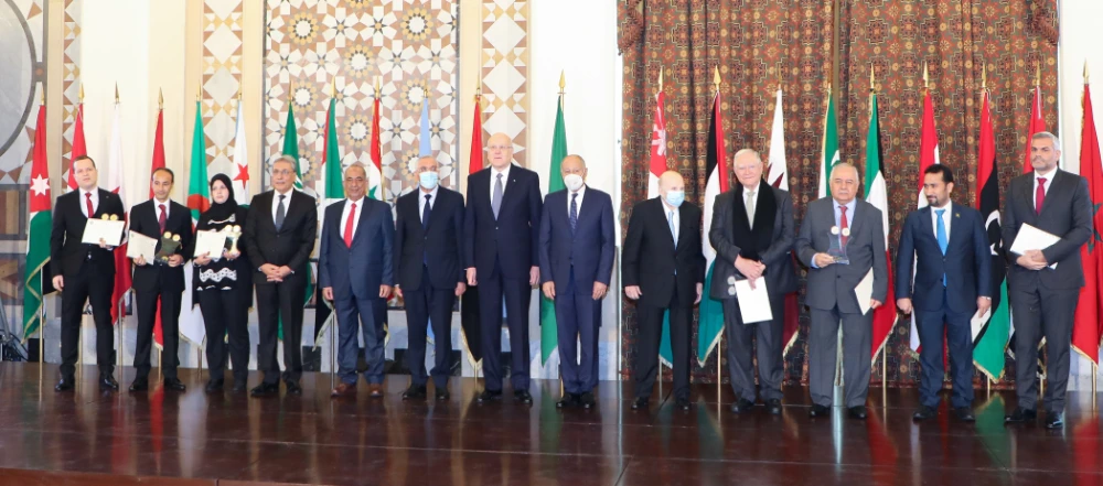 Lebanese Prime Minister Najib Mikati, Arab League Secretary-General Ahmed Aboul Gheit and Arab ministers with the award winners. (Supplied)