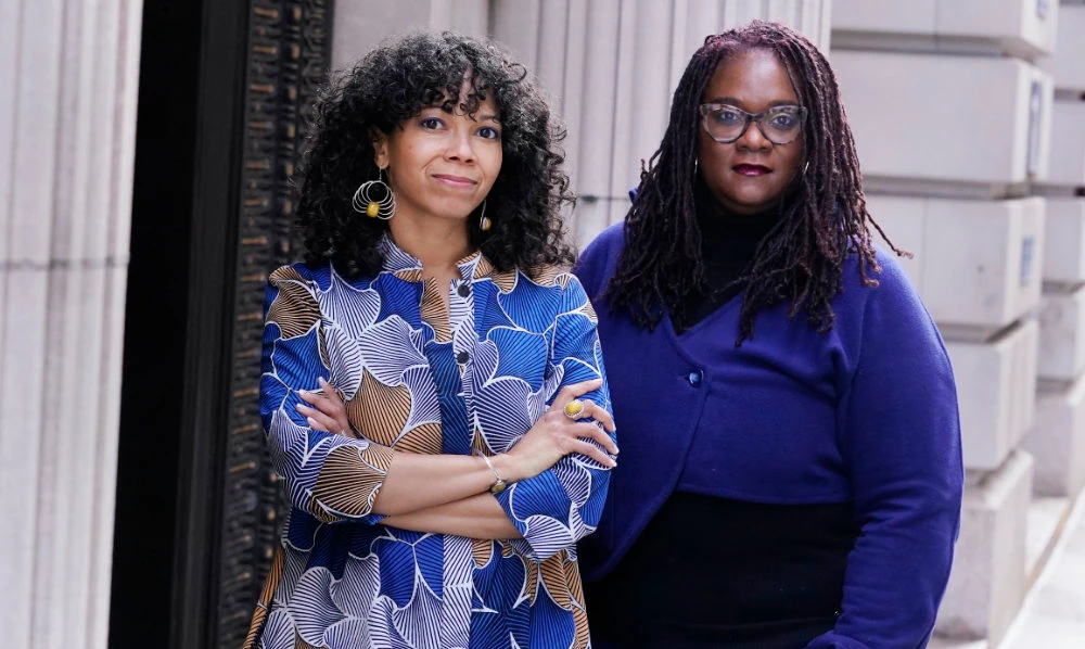 Amber Payne, left, and Deborah Douglas co-editors-in-chief of the new online publication of "The Emancipator" pose together, Wednesday, Feb. 2, 2022, in Boston. (AP)