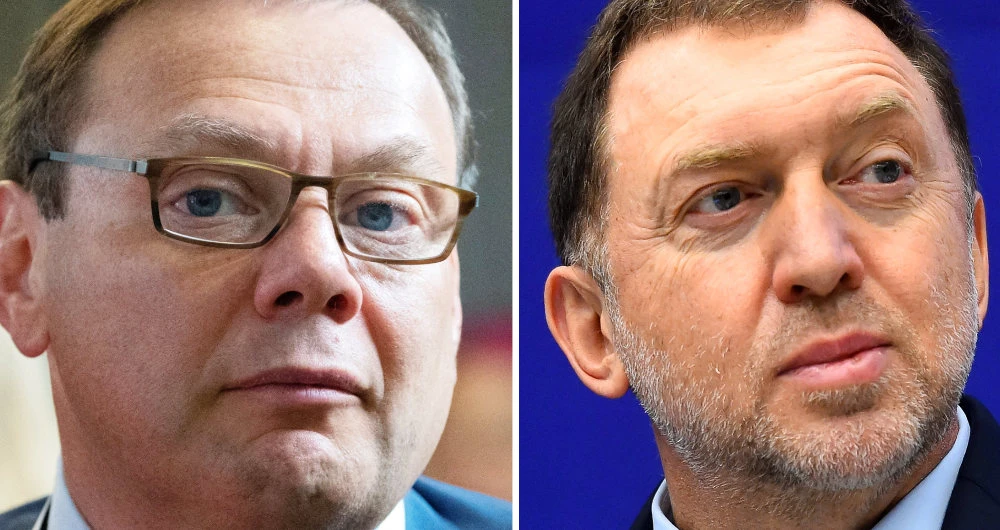 Mikhail Fridman (L) and Oleg Deripaska. (AFP file photo)