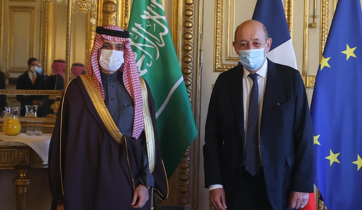 Saudi Arabia's Foreign Minister Prince Faisal bin Farhan meets with French Foreign Minister Jean-Yves Le Drian in Paris on Monday. (SPA)