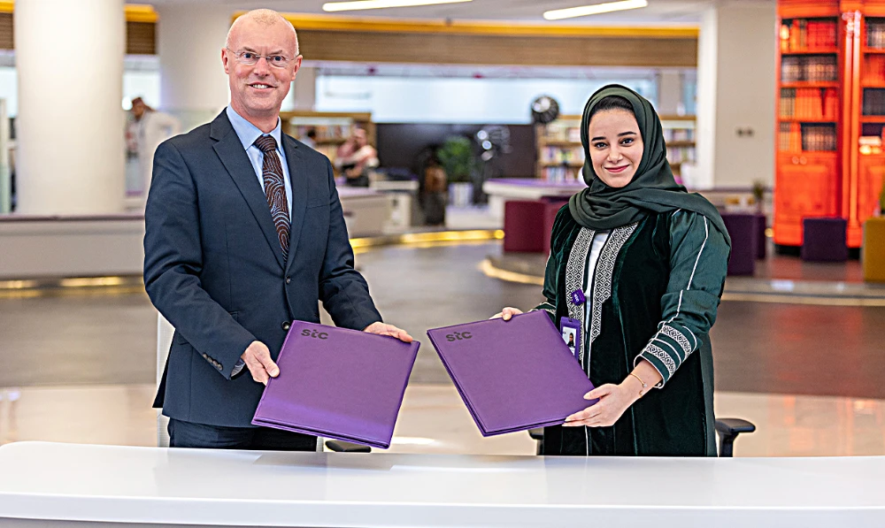 Prof. Zeger Degraeve, executive dean at MBSC, and Dr. Moudhi Al-Jamea, vice president at stc and the dean of stc Academy, at the recent signing ceremony.