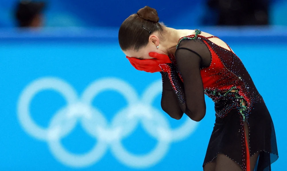 Kamila Valieva of the Russian Olympic Committee reacts after her performance in Beijing Olympics. (Reuters)
