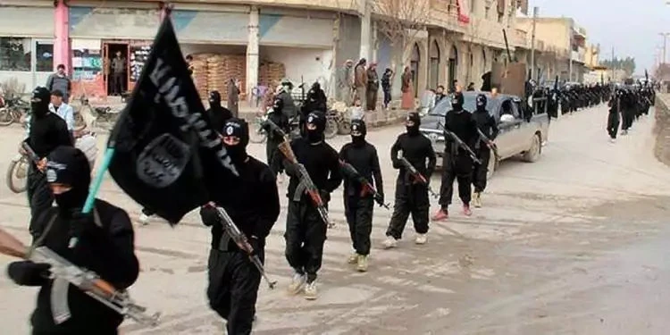 Daesh fighters march in Raqqa, Syria, at the height of the so-called "ISIS caliphate" in 2014. (AP file photo)