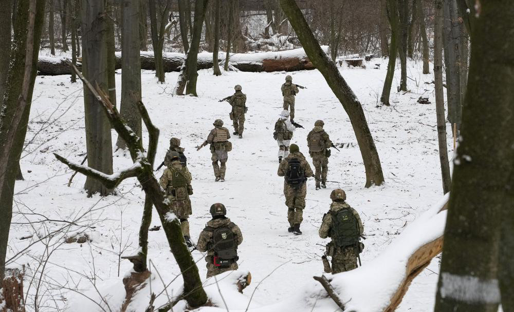 Members of Ukraine's Territorial Defense Forces, volunteer military units of the Armed Forces, train in a city park in Kyiv, Ukraine. (AP/File)