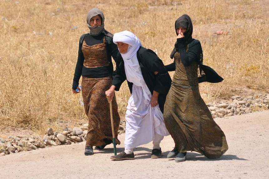Yazidi women on the outskirts of Sinjar, northern Iraq, Aug. 2014. (Reuters)