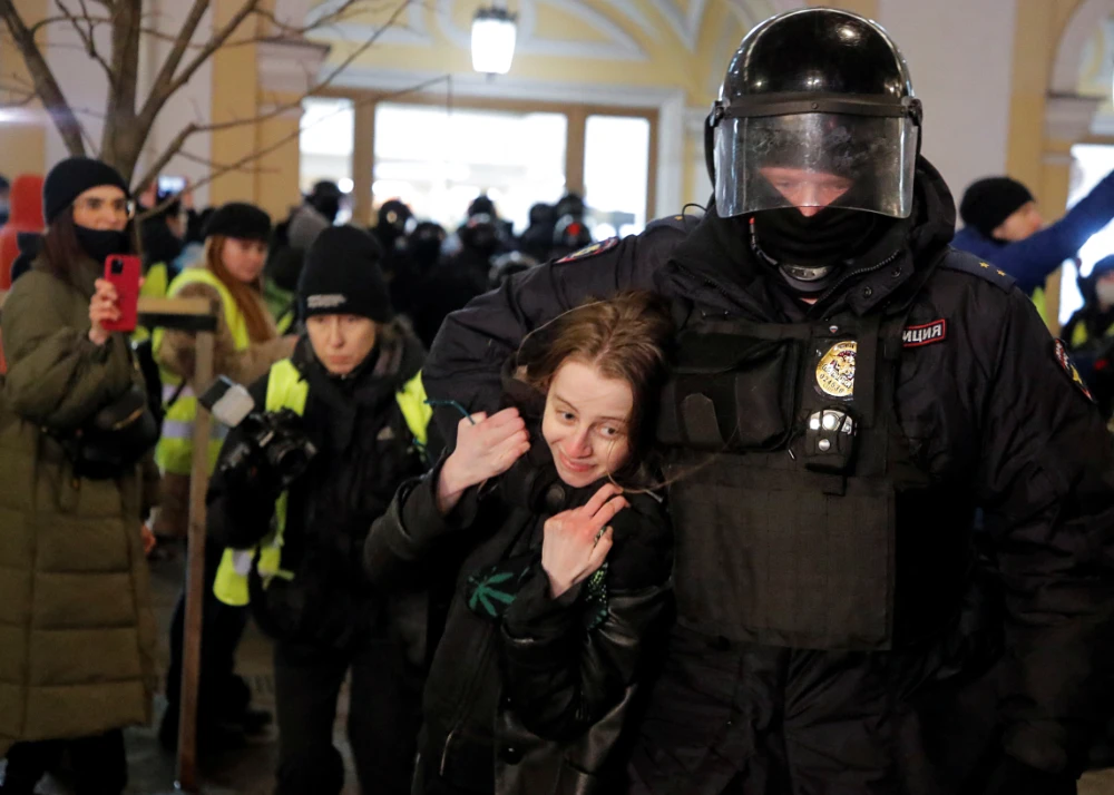 A Russian law enforcement officer detains a demonstrator during an anti-war protest against Russia's invasion of Ukraine, in Saint Petersburg, Russia March 2, 2022. (Reuters)