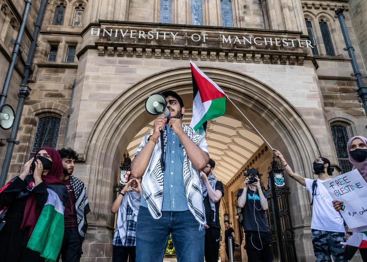 Students protest outside the University of Manchester. (File/AFP)