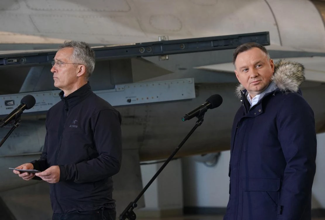 NATO Secretary General Jens Stoltenberg and Polish President Andrzej Duda address a press conference on Tuesday in Poland. (AFP)
