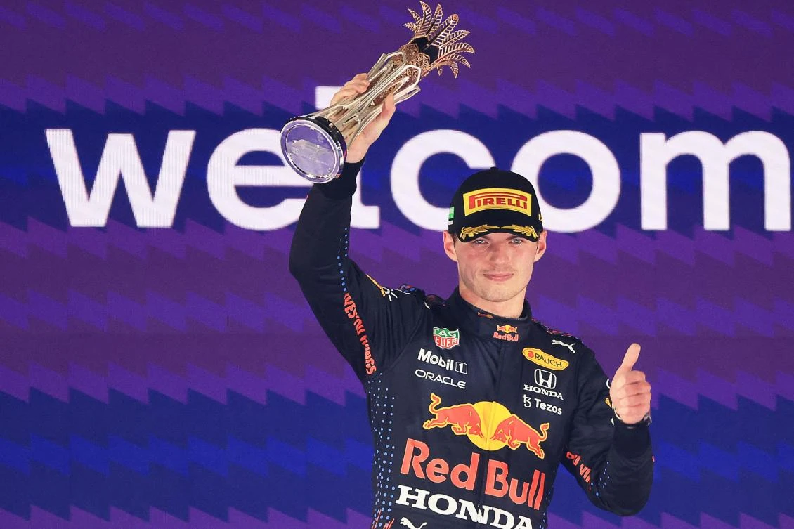 Red Bull’s Dutch driver Max Verstappen poses on the podium after Formula One Saudi Arabian Grand Prix at the Jeddah Corniche Circuit in Jeddah. (AFP)