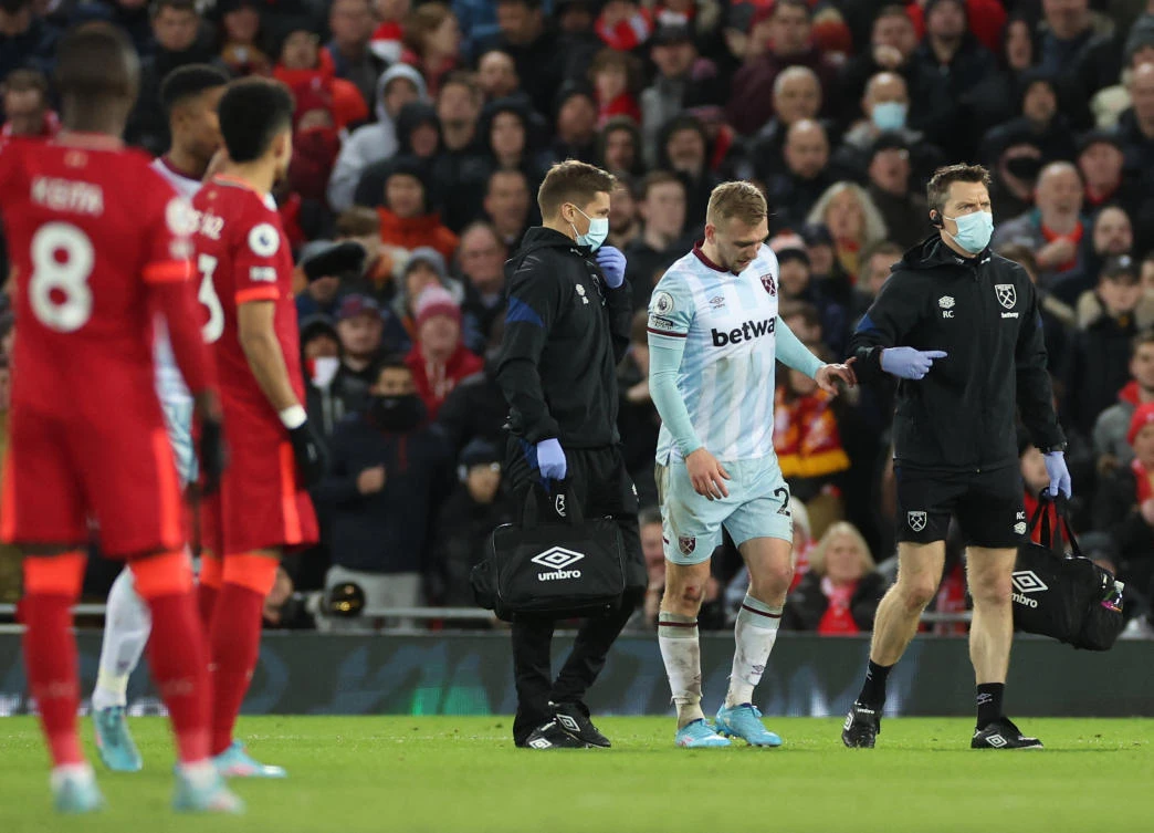 West Ham United’s Jarrod Bowen leaves the pitch after sustaining an injury during their Premier League match against Liverpool at Anfield on Saturday. (Reuters)