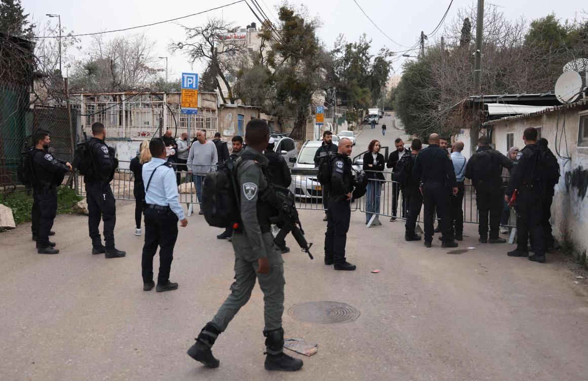 An Israeli checkpoints bars the entrance to Sheikh Jarrah, a day after the Supreme Court froze the eviction of four Palestinian families from the flashpoint east Jerusalem neighborhood, on March 2, 2022. (AP)