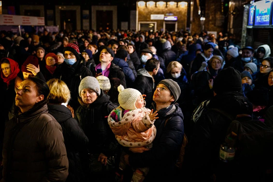 People wait to board an evacuation train at Kyiv central train station on March 5, 2022. (File/AFP)