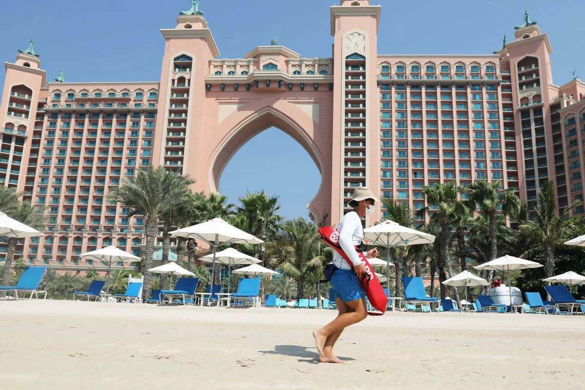 A beach lifeguard is seen at the Atlantis The Palm hotel, as the Emirates reopen to tourism amid coronavirus disease (COVID-19). (Reuters)