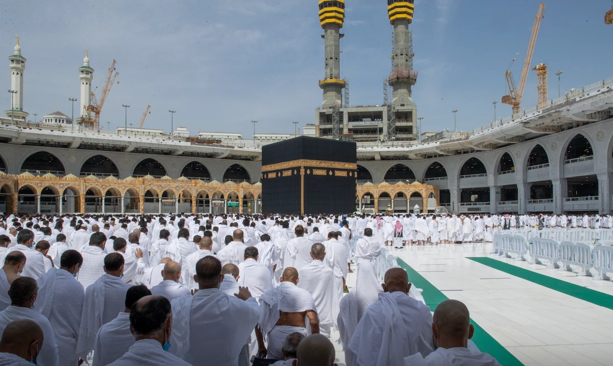Worshipers pray shoulder-to-shoulder at the Two Holy Mosques after COVID-19 restrictions lifted