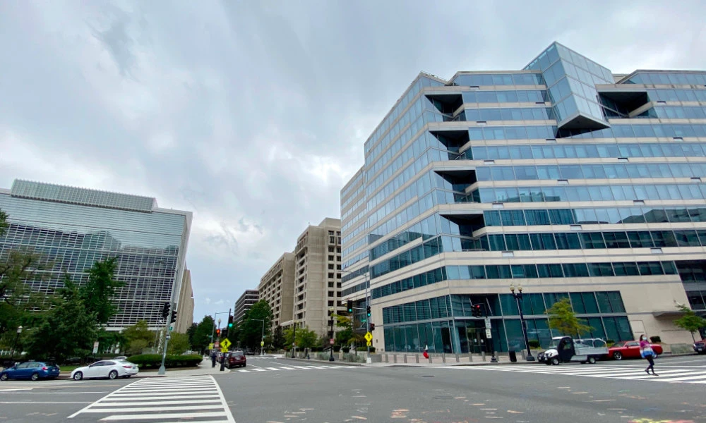 In this file photo taken on September 25, 2020, the World Bank Group building (L) and the International Monetary Fund building (R) in Washington, DC. (AFP)
