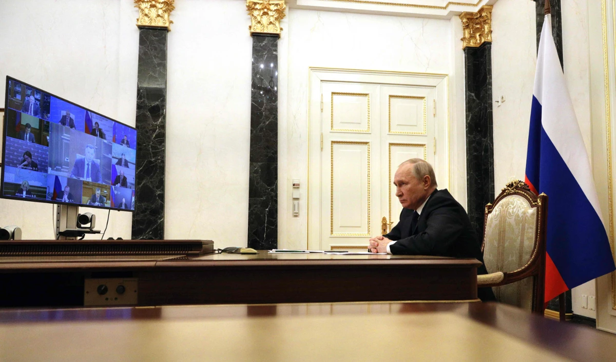 Russian President Vladimir Putin chairs a meeting with members of the Russian government via teleconference in Moscow. (AFP)