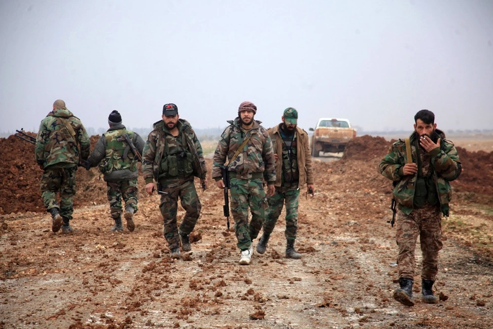 Syrian regime forces in an area south of the town of Al-Bab, in the northern province of Aleppo on January 14, 2016. (AFP/File)