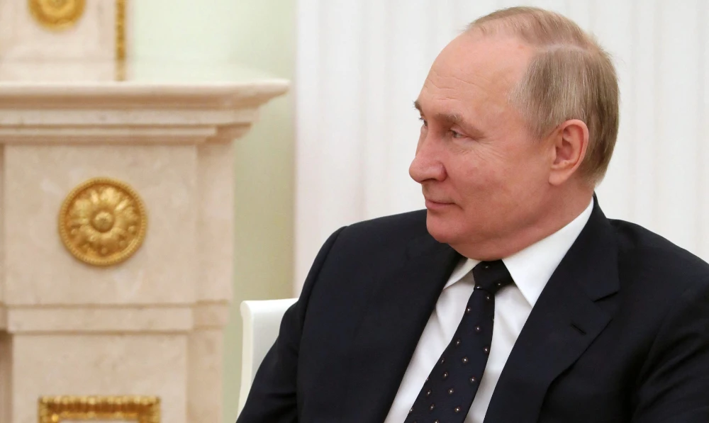 Russian President Vladimir Putin attends a meeting with his Belarus' counterpart at the Kremlin in Moscow on March 11, 2022. (AFP)