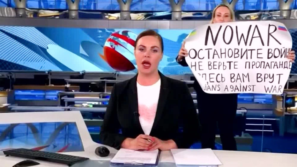 Russian court fines TV protester amid outcry
