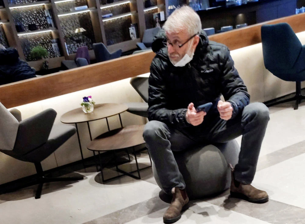 Sanctioned Russian oligarch Roman Abramovich sits in a VIP lounge before a jet linked to him took off for Istanbul from Ben Gurion international airport in Lod near Tel Aviv, Israel, March 14, 2022. (REUTERS)
