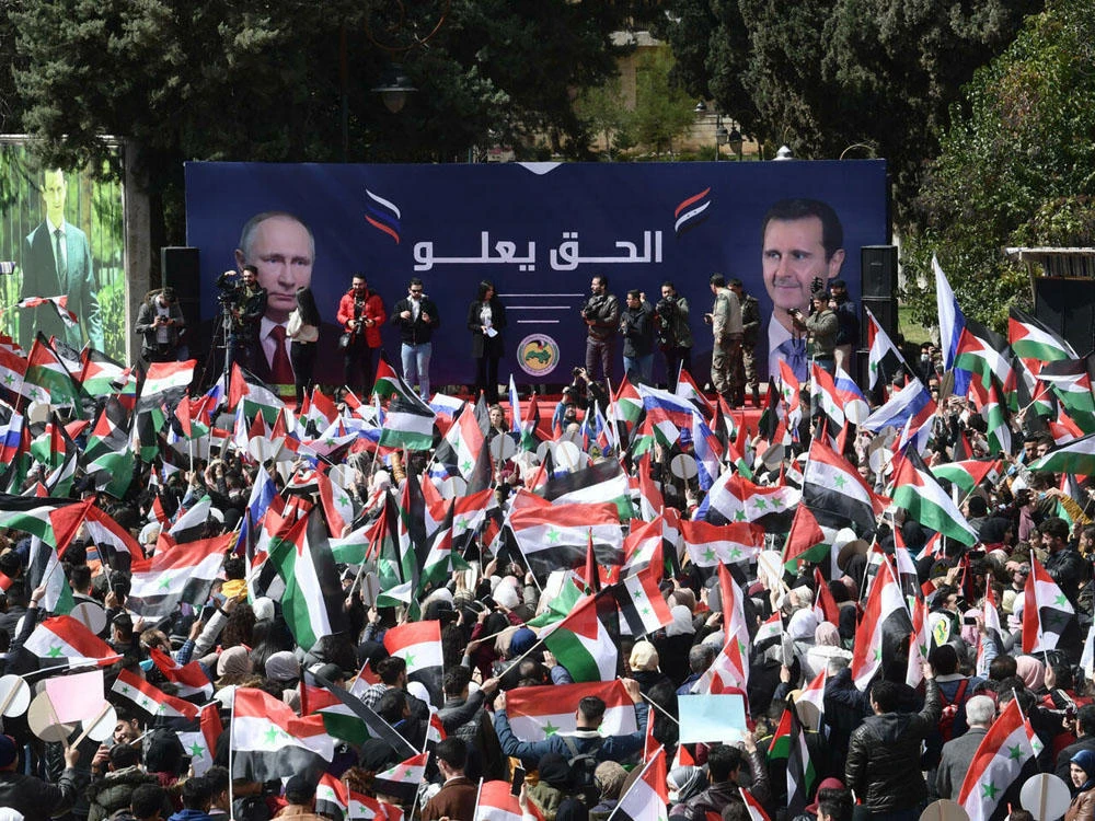 Students demonstrate in support of Russia following its invasion of Ukraine, at a university campus in the Syrian city of Aleppo, March 10, 2022. (AFP)