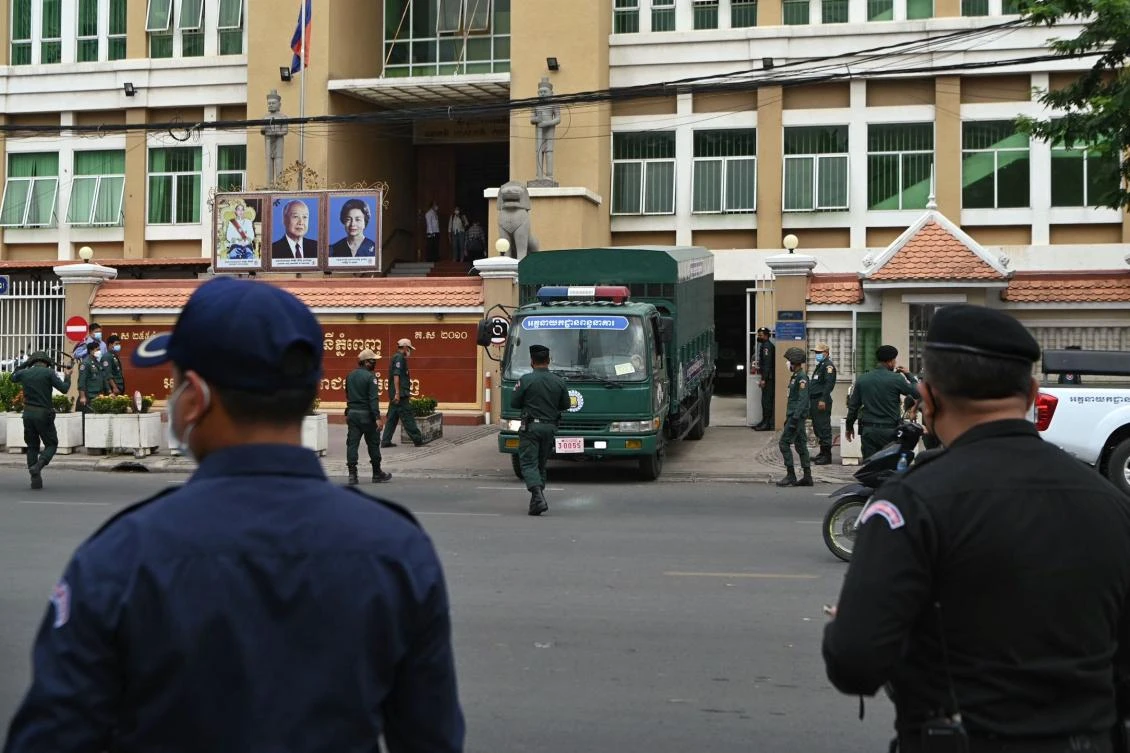 A prison van transports opposition members at Phnom Penh Municipal Court in Phnom Penh on March 17, 2022 who were handed varying jail sentences. (AFP)