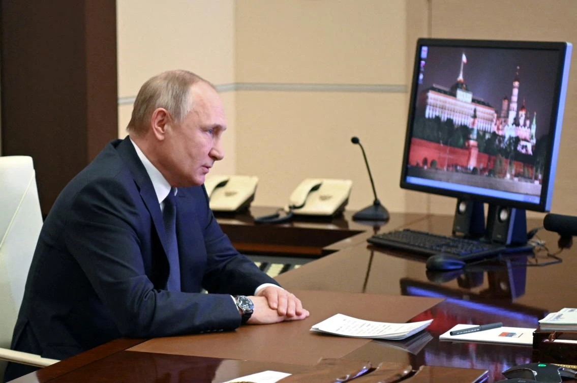 Russian President Vladimir Putin chairs an earlier meeting with members of the Security Council via a video link outside Moscow on Mar. 3, 2022. (Kremlin via Reuters)