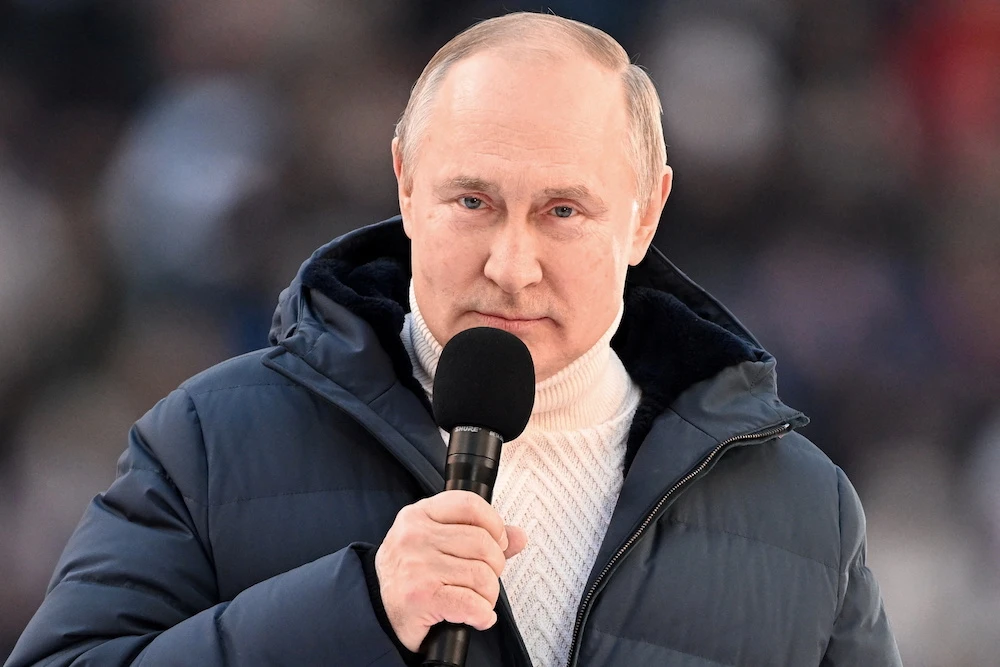 Putin appears at big rally as troops press attack in Ukraine