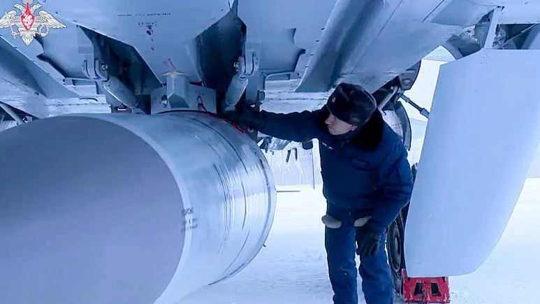 Russia claims hypersonic missile strike as Ukraine urges peace deal