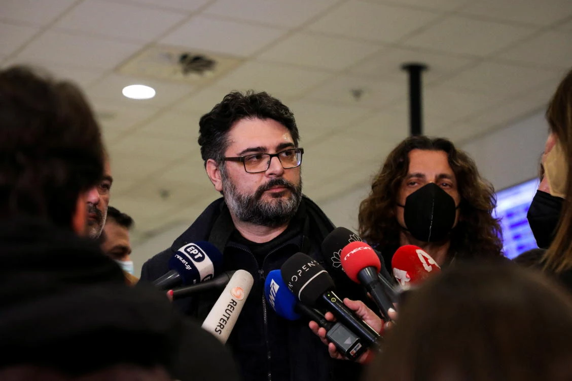 Greece’s Consul General Manolis Androulakis talks to the media after arriving back in Greece from Mariupol, Athens, Mar. 20, 2022. (Reuters)