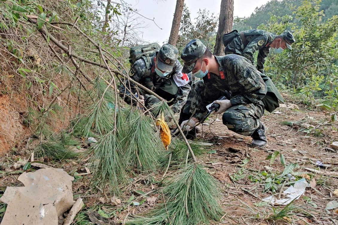Hopes of finding any survivors had all but vanished a day after the Boeing 737-800 passenger jet nosedived into the mountain. (AFP)