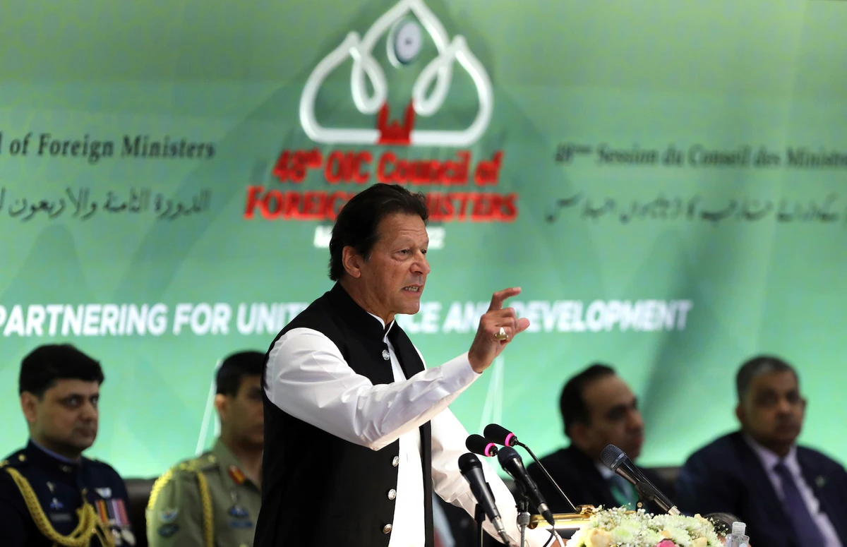 Pakistan's PM Imran Khan speaks at the start of a two-day gathering of the OIC at the Parliament House in Islamabad, Pakistan, Tuesday, March 22, 2022. (AP)