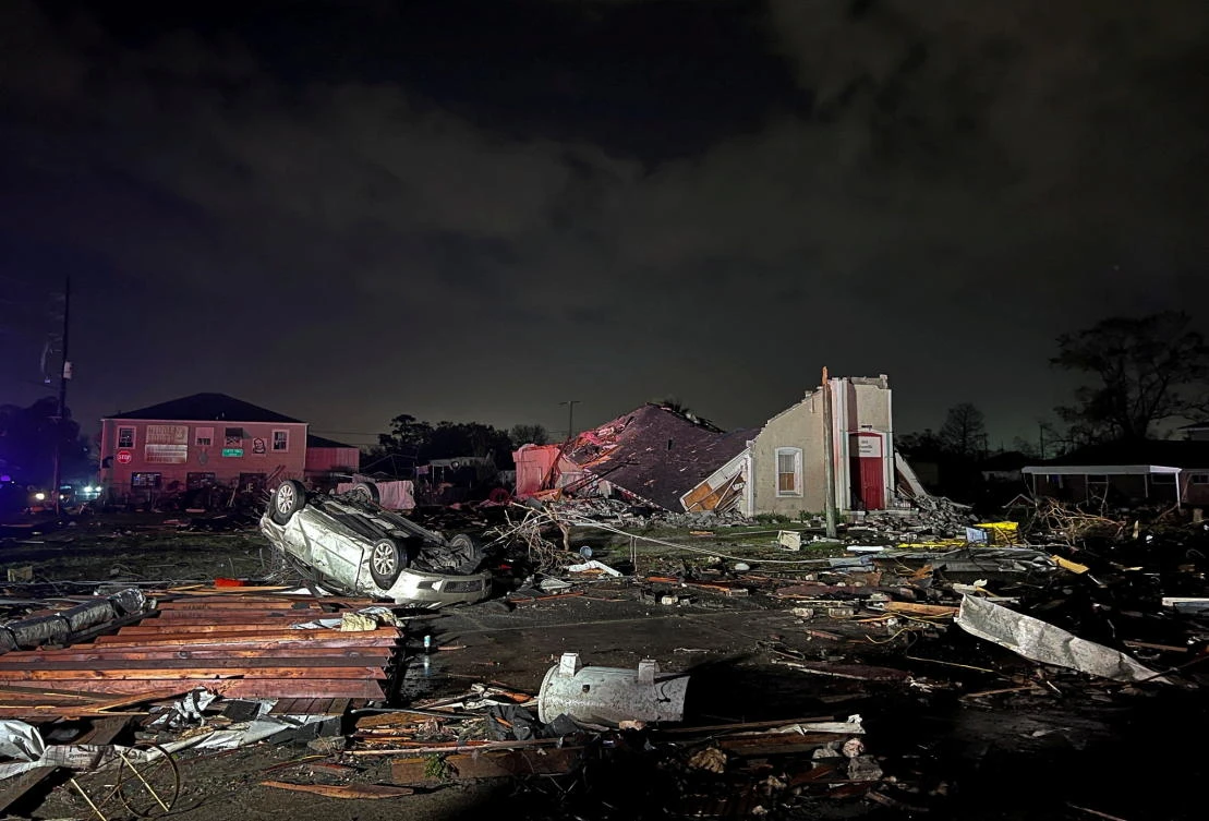 Images circulating on local TV channels and online showed homes torn apart, with light poles, power lines and debris strewn across the streets. (Reuters)