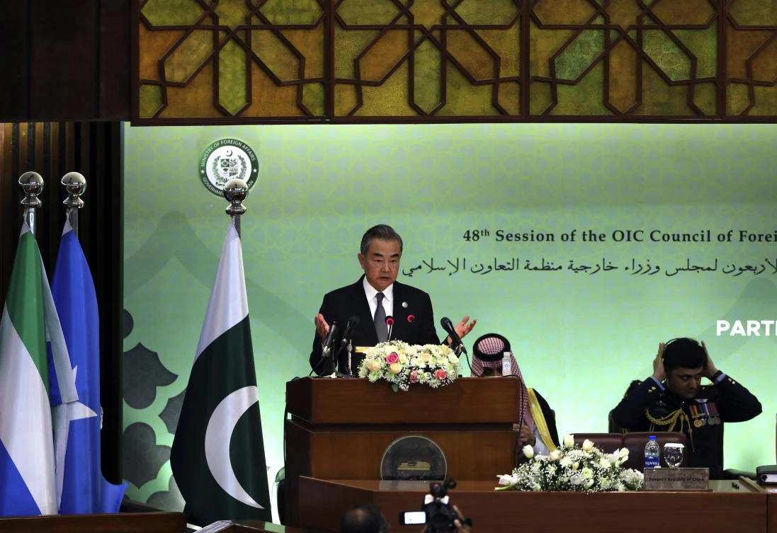 Beijing hosts next week a meeting of Afghanistan’s neighbors to see how they can help the country. Above, Chinese Foreign Minister Wang Yi at the Organization of Islamic Cooperation gathering in Islamabad, Pakistan on Mar. 22, 2022. (AP)
