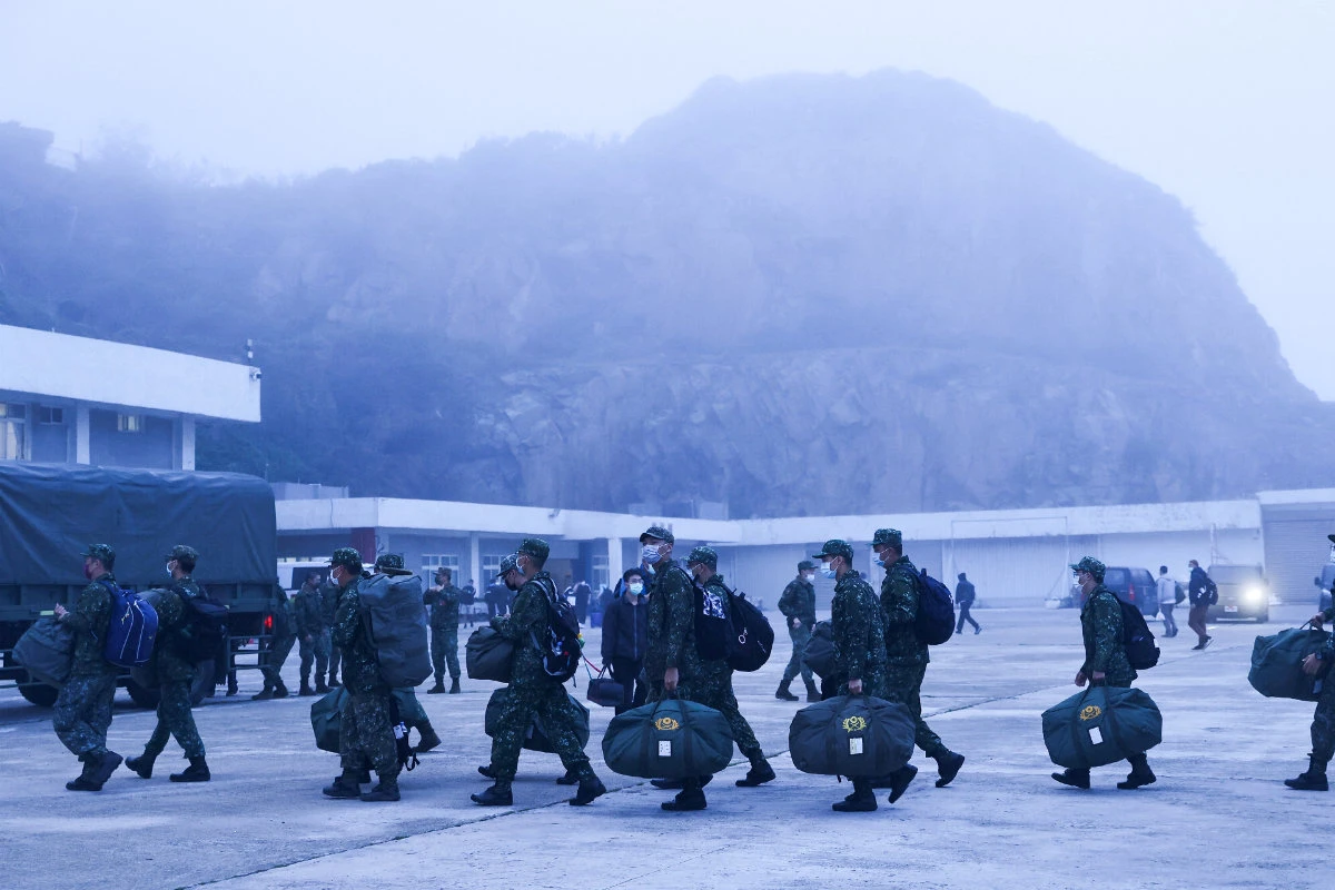 Taiwanese soldiers arrive by ferry at Dongyin island, near China's coast, on March 17, 2022. (REUTERS/Ann Wang)
