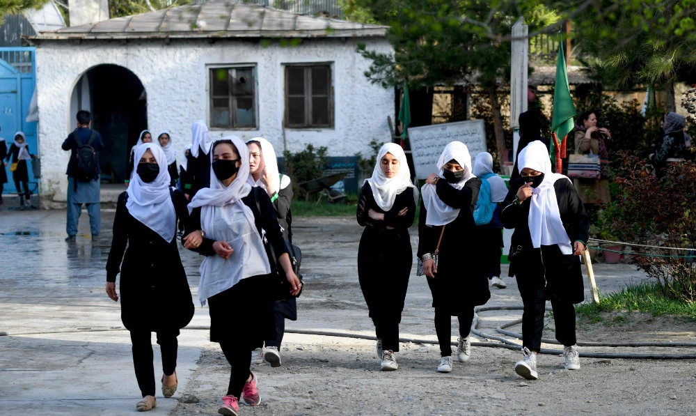 Female foreign ministers from 16 countries around the world said Friday they are “deeply disappointed” that Afghan girls are being denied access to secondary schools and called on the Taliban to reverse their decision. (AFP)